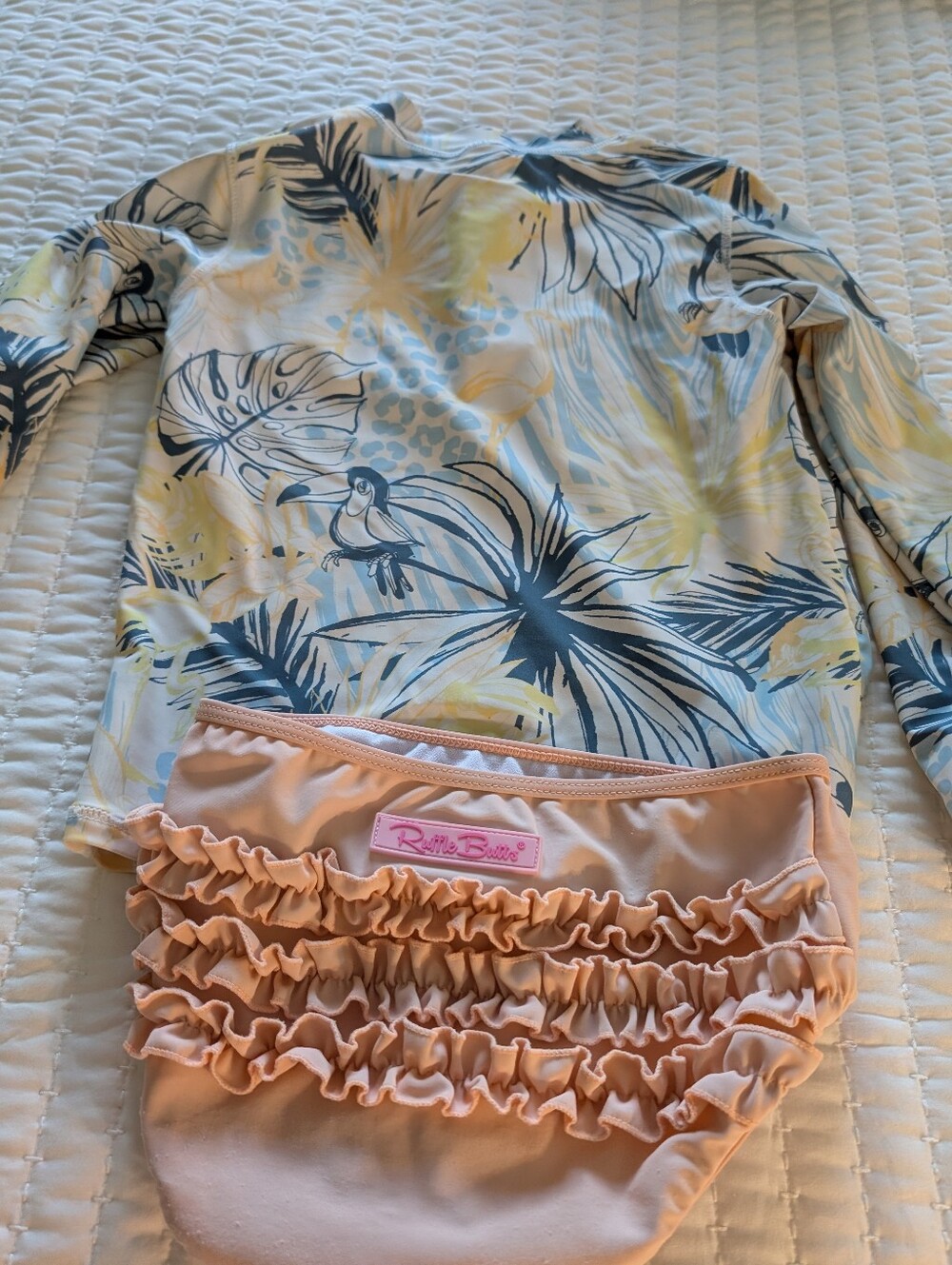 Ruffle Butts Peach Ruffle Swim Bottoms with Tropical Blue & Yellow Rash Guard